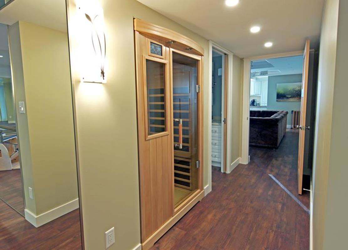 Built-in infrared sauna in lower level of home