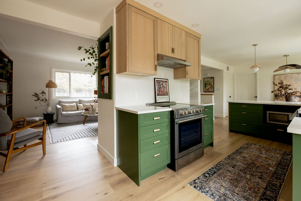 Modern kitchen with wood and green cabinets