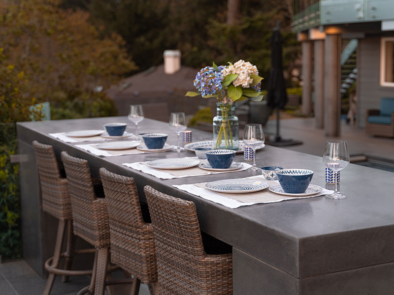 Outdoor bar seating with tableware
